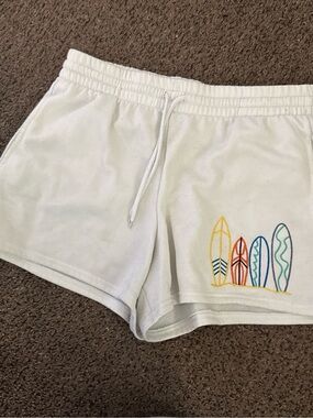 White Women's Athletic Shorts with Surfboard Embroidery